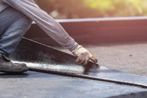 Professional Basement Waterproofing technician working in Montezuma, NY
